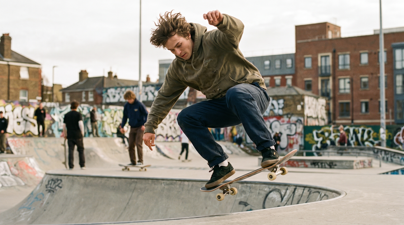 Skateboarder performing a trick at a skatepark